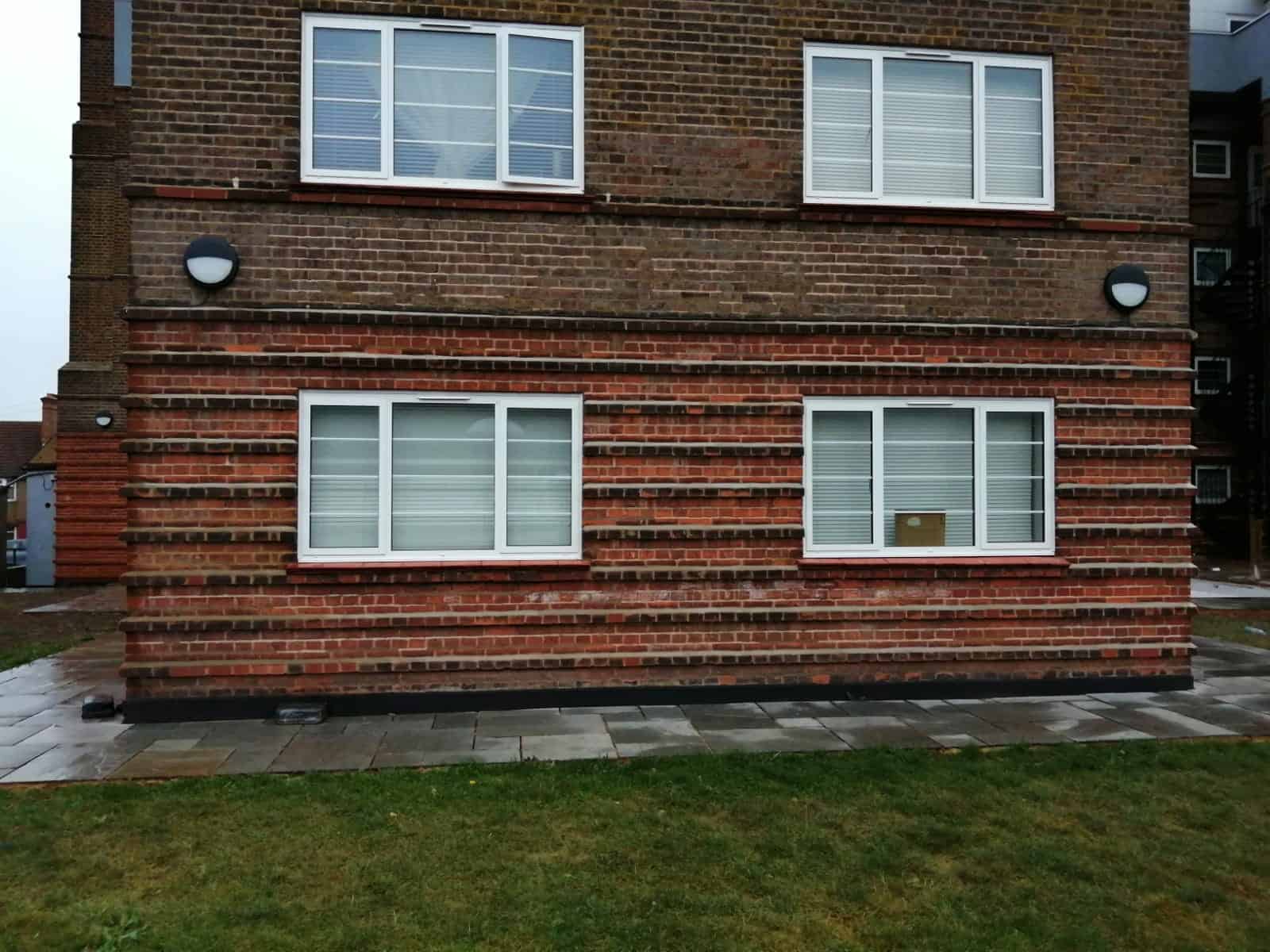 Remove black stains from brickwork